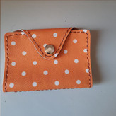 جاکارتی فانتزی چرم مصنوعی نارنجی خالدار